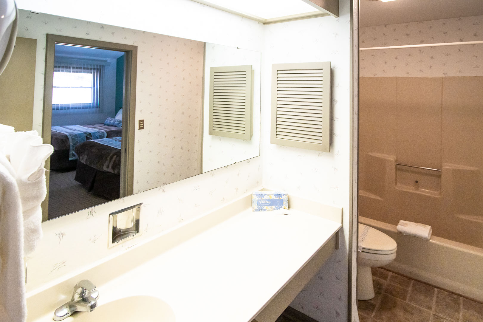 A clean and spacious bathroom at VRI's Fox Run Resort in North Carolina.